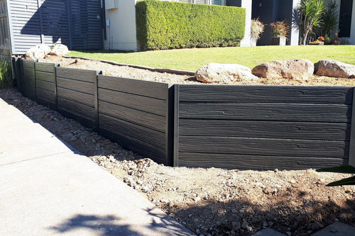 Charcoal timber-look concrete sleeper garden wall